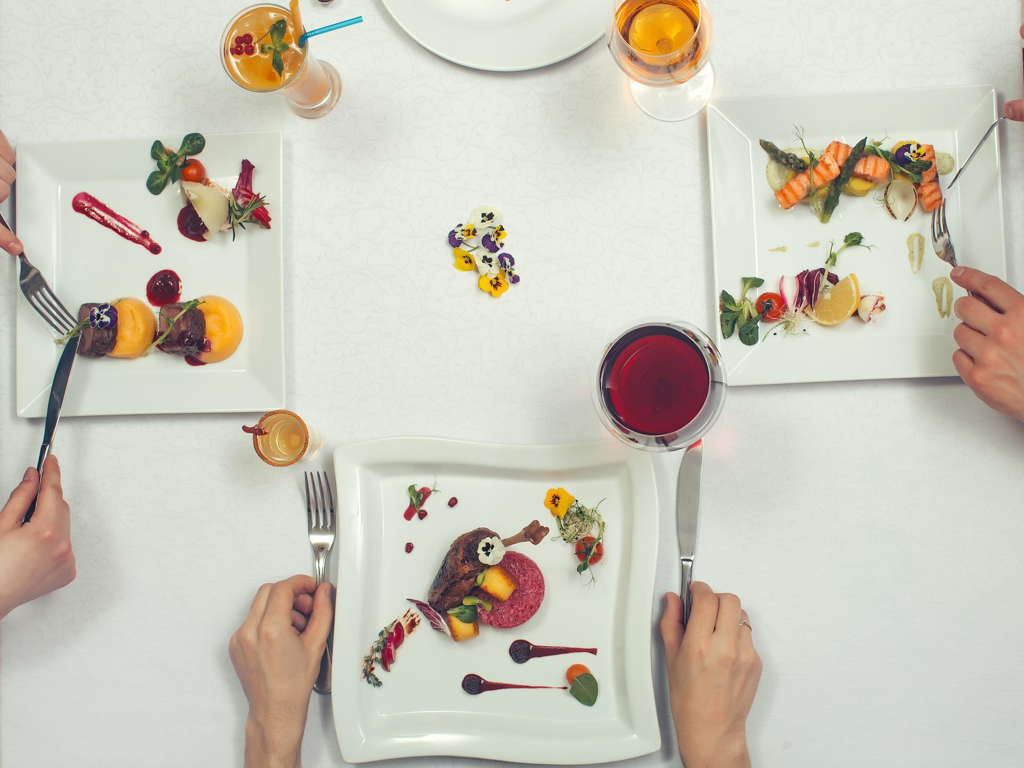 Large editorial shot of workshop table with prepared dishes